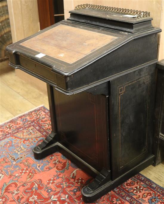 A Victorian ebonised Davenport, W.53cm